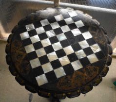 A VICTORIAN PAPIER MACHE MOTHER OF PEARL INLAID TABLE. 52 cm x 70 cm.