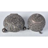 Two Indian Silver Condiments with Heavy Embossed decoration. Largest 5.5cm x 4.2cm, total weight 86g