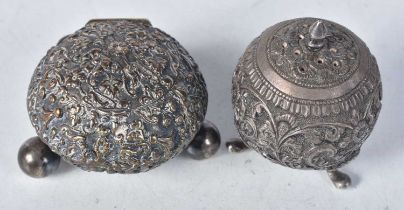 Two Indian Silver Condiments with Heavy Embossed decoration. Largest 5.5cm x 4.2cm, total weight 86g