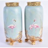 A CHARMING PAIR OF ROYAL WORCESTER RETICULATED PORCELAIN FLAMENGO VASES by Charlie Johnson. 14 cm