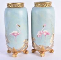 A CHARMING PAIR OF ROYAL WORCESTER RETICULATED PORCELAIN FLAMENGO VASES by Charlie Johnson. 14 cm