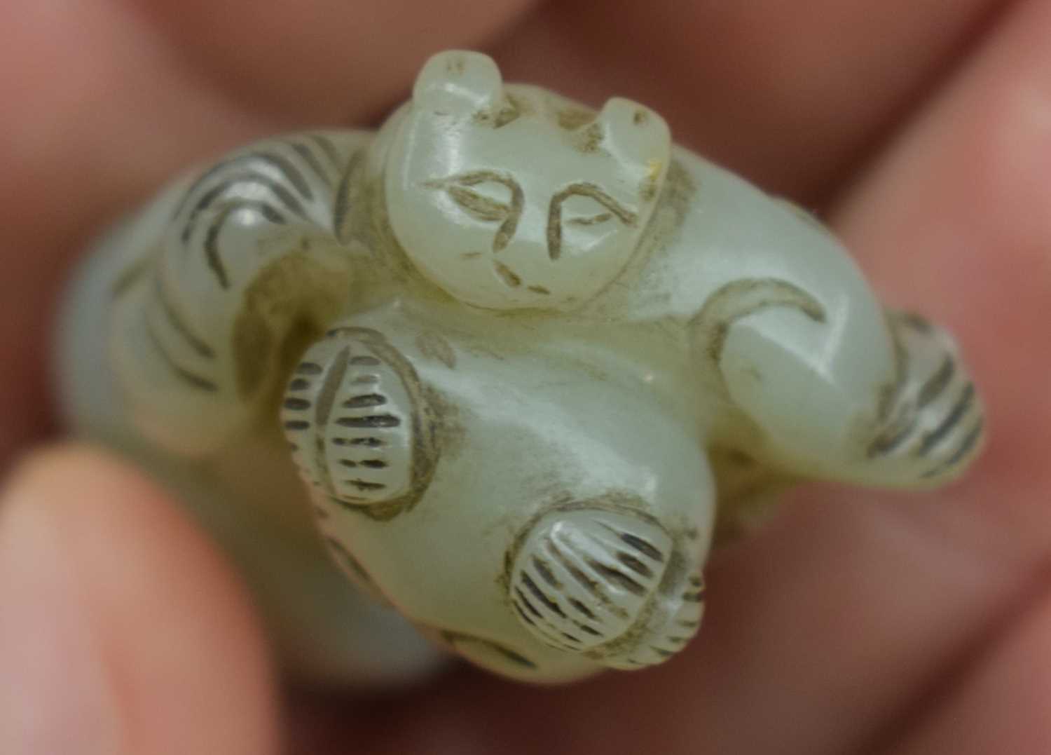 A 19TH CENTURY CHINESE CARVED GREEN JADE FIGURE OF A DANCING BOY Qing, modelled with a cat upon - Image 10 of 12