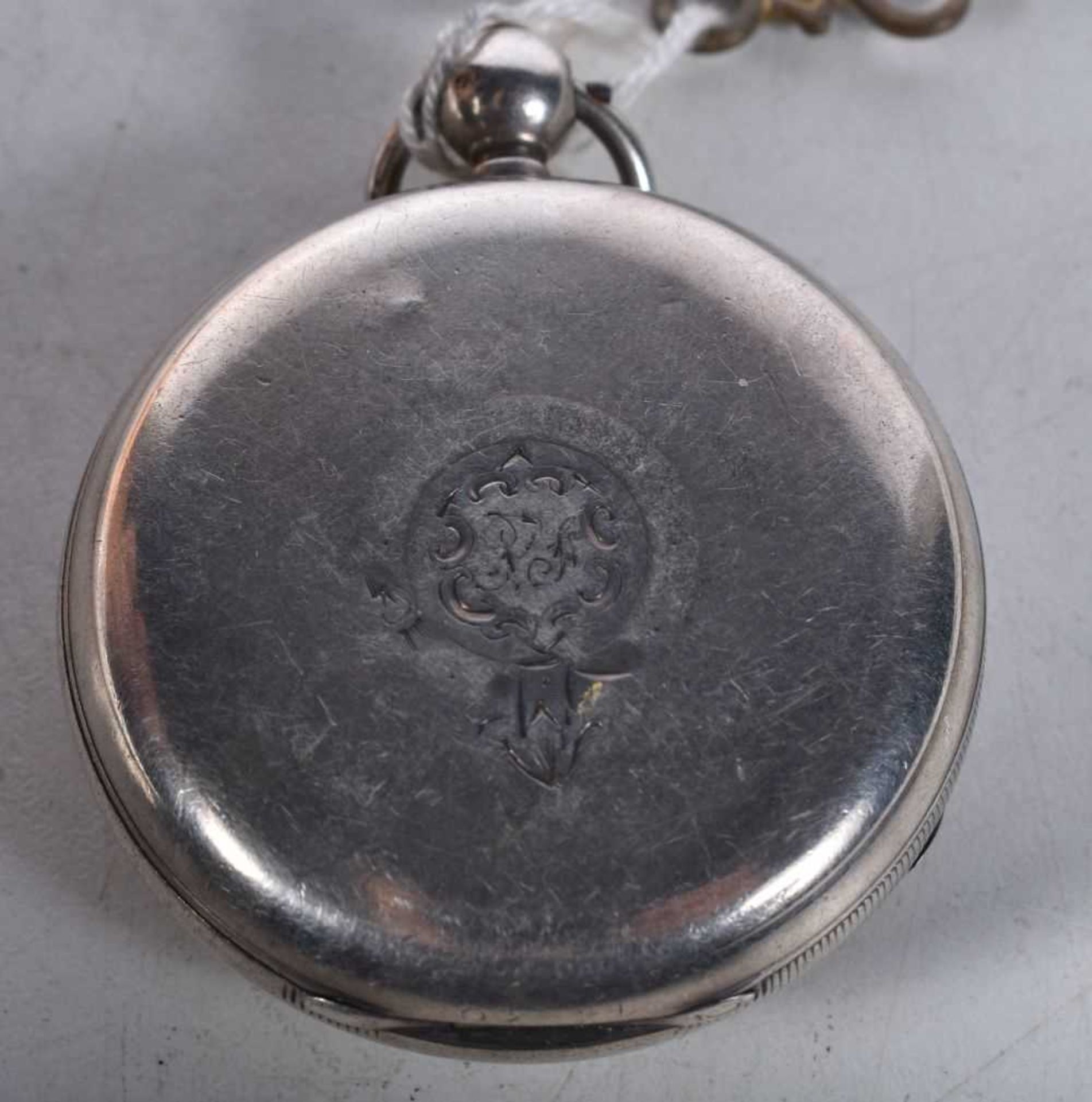 A Victorian Silver Pocket Watch. Hallmarked London 1884. 4.6cm diameter, weight 94g. Runs then - Image 2 of 3