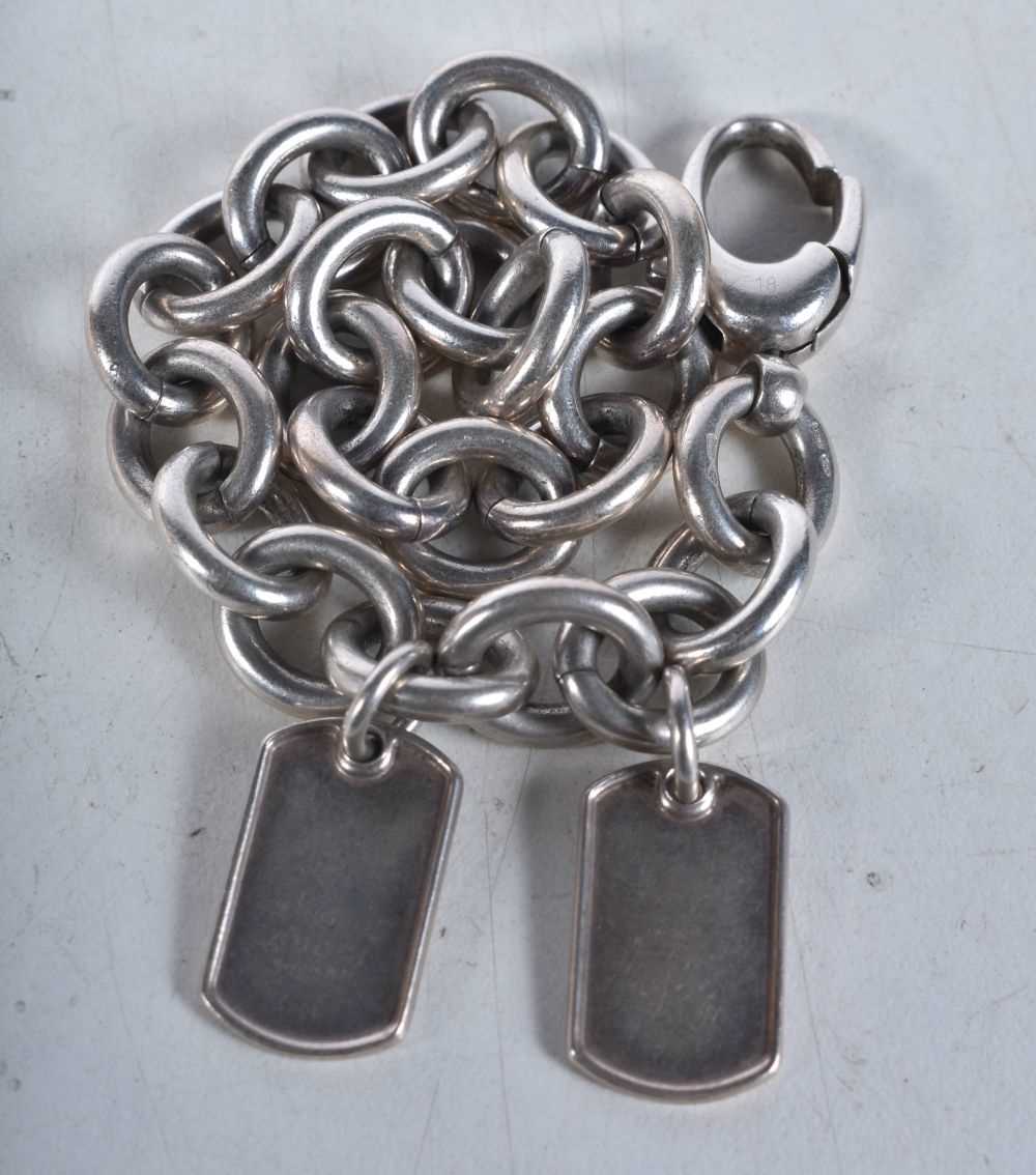 Silver bracelet with dog tags by designer Gucci. Stamped Gucci, 21cm long, weight 58g