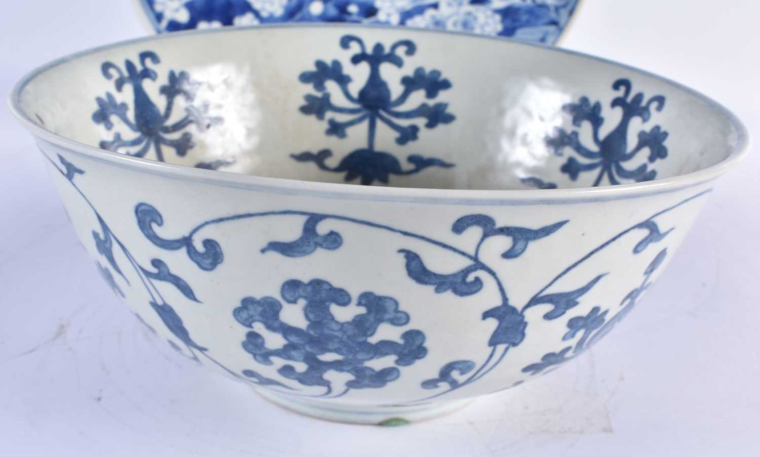 A LARGE 19TH CENTURY CHINESE BLUE AND WHITE PORCELAIN PRUNUS DISH Qing, together with a blue and - Image 2 of 3