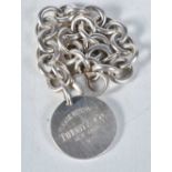 Silver belcher link bracelet with round tag by designer Tiffany & Co. Stamped 925 Tiffany, length
