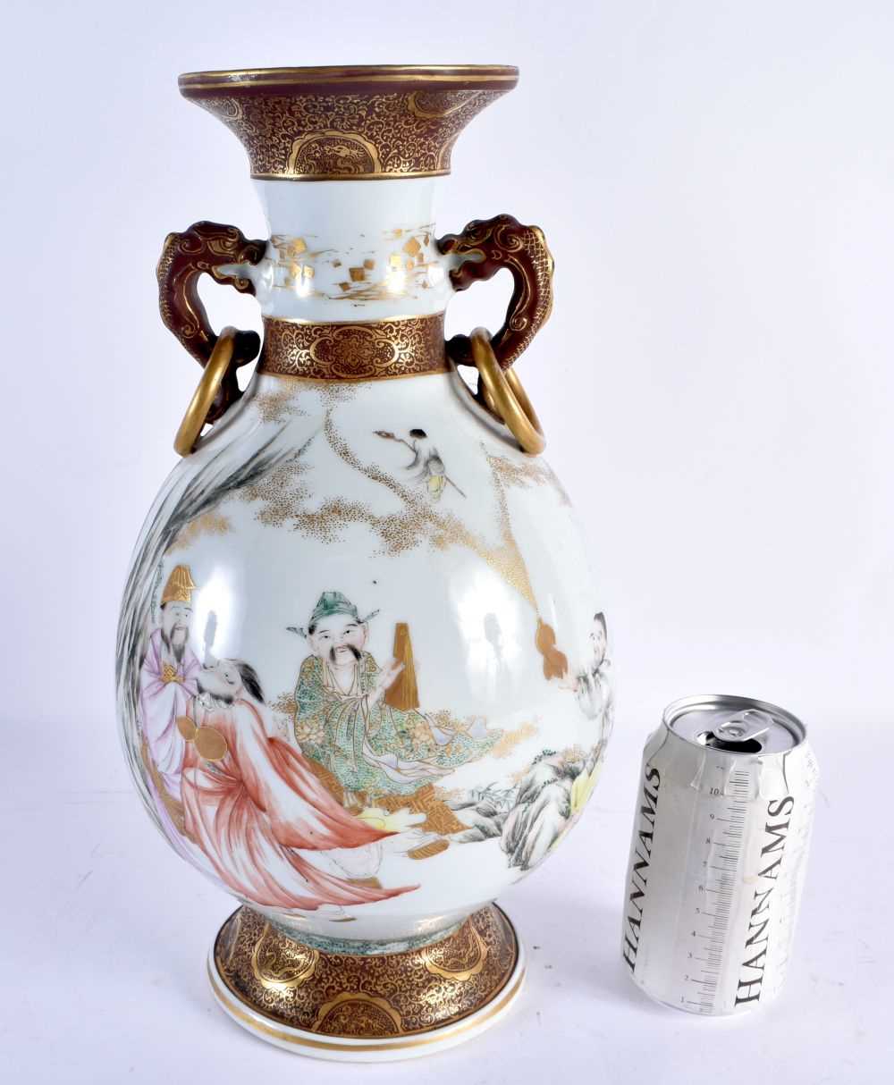 A LARGE 19TH CENTURY JAPANESE MEIJI PERIOD TWIN HANDLED KUTANI PORCELAIN VASE painted with figures