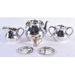 AN EARLY 20TH CENTURY JAPANESE MEIJI PERIOD SILVER TEASET of plain form. 638 grams. Largest 20.5