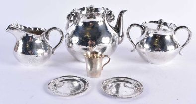 AN EARLY 20TH CENTURY JAPANESE MEIJI PERIOD SILVER TEASET of plain form. 638 grams. Largest 20.5