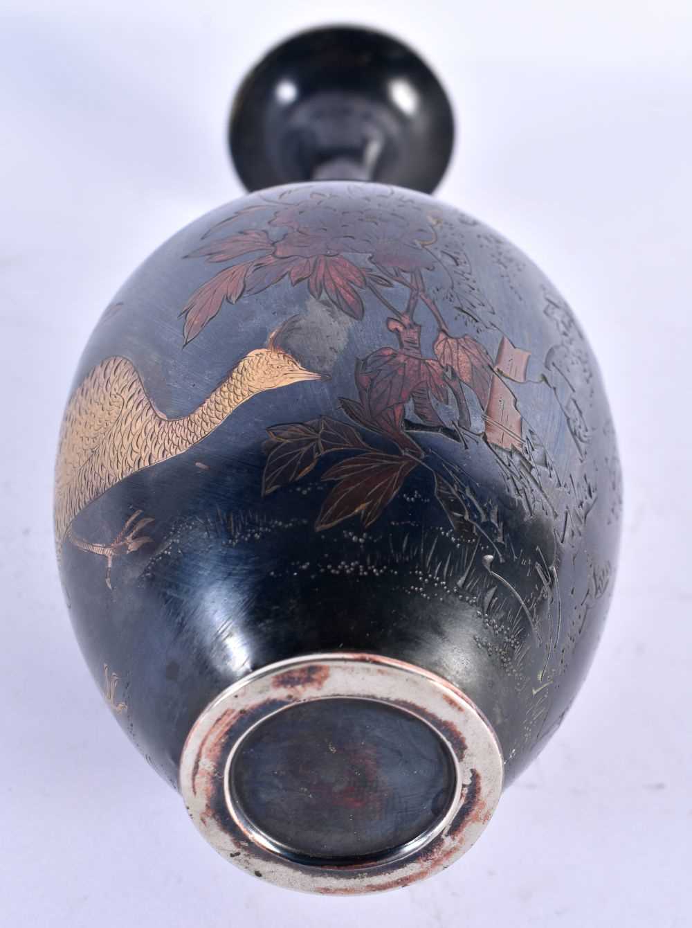 A LATE 19TH CENTURY JAPANESE MEIJI PERIOD SILVER AND SHAKUDO VASE engraved with birds and - Image 4 of 4