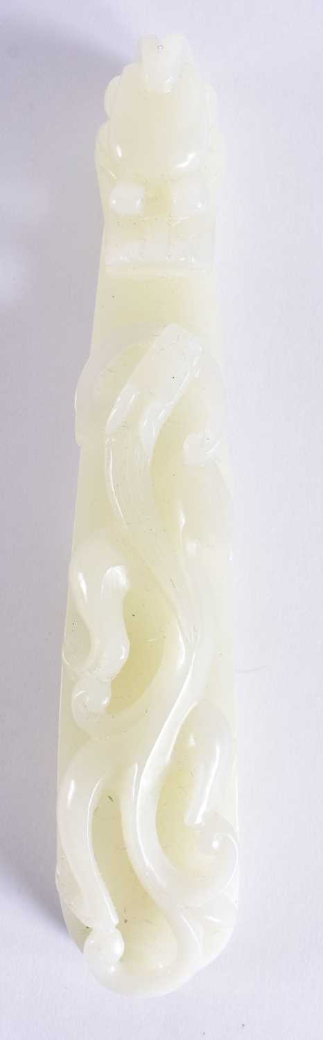 A FINE PAIR OF CHINESE QING DYNASTY CARVED GREENISH WHITE JADE BELT HOOKS Qing, formed as stylised - Image 13 of 30