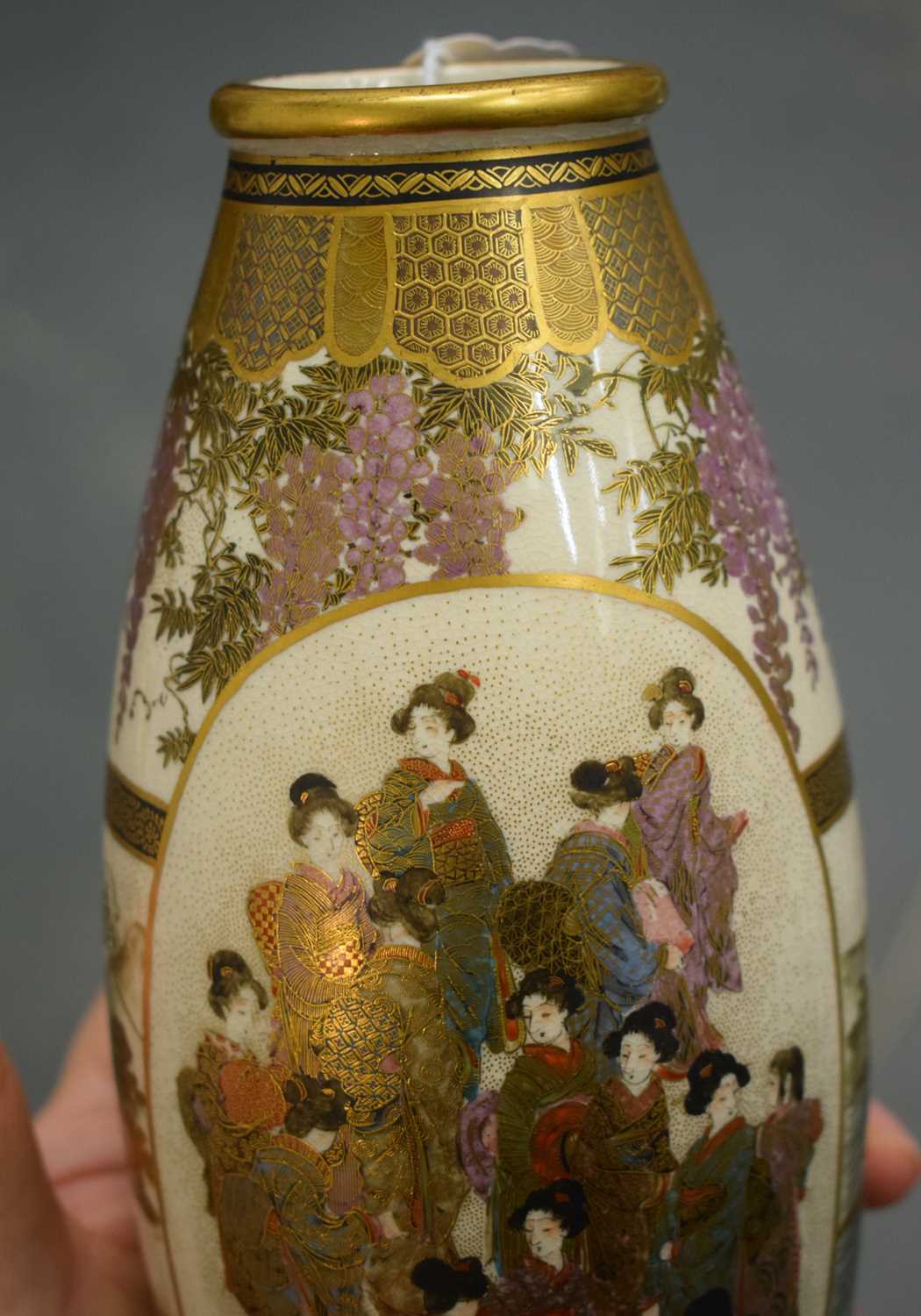 A PAIR OF LATE 19TH CENTURY JAPANESE MEIJI PERIOD SATSUMA POTTERY VASES painted with a group of - Image 7 of 25