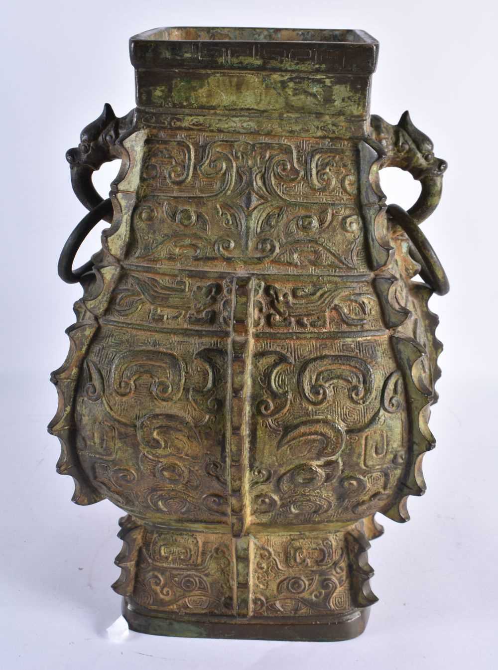 AN EARLY 20TH CENTURY CHINESE TWIN HANDLED BRONZE ARCHAIC VASE Late Qing/Republic, decorated with - Image 5 of 7