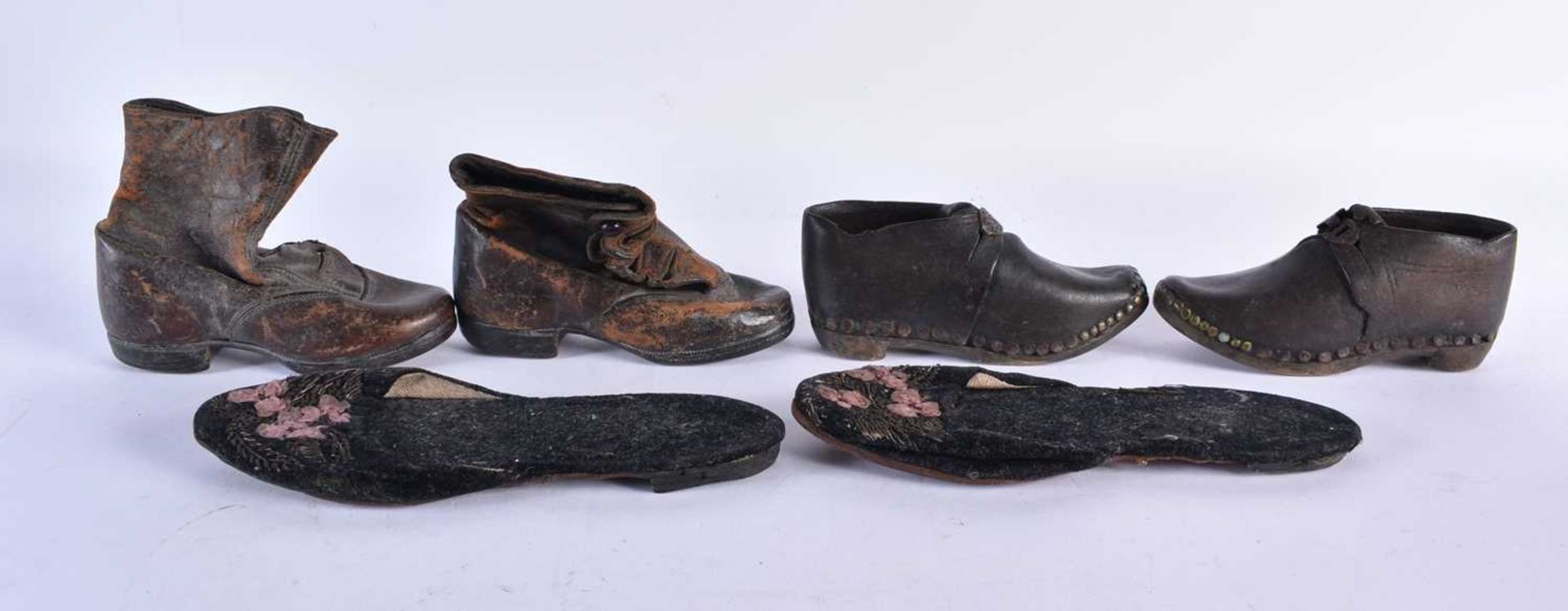 THREE PAIRS OF ANTIQUE CHILDRENS SHOES. Largest 18 cm wide. (6)