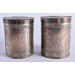 A PAIR OF ANTIQUE CONTINENTAL SILVER COIN INSET BOXES AND COVERS. 344 grams. 9 cm x 7.25 cm.