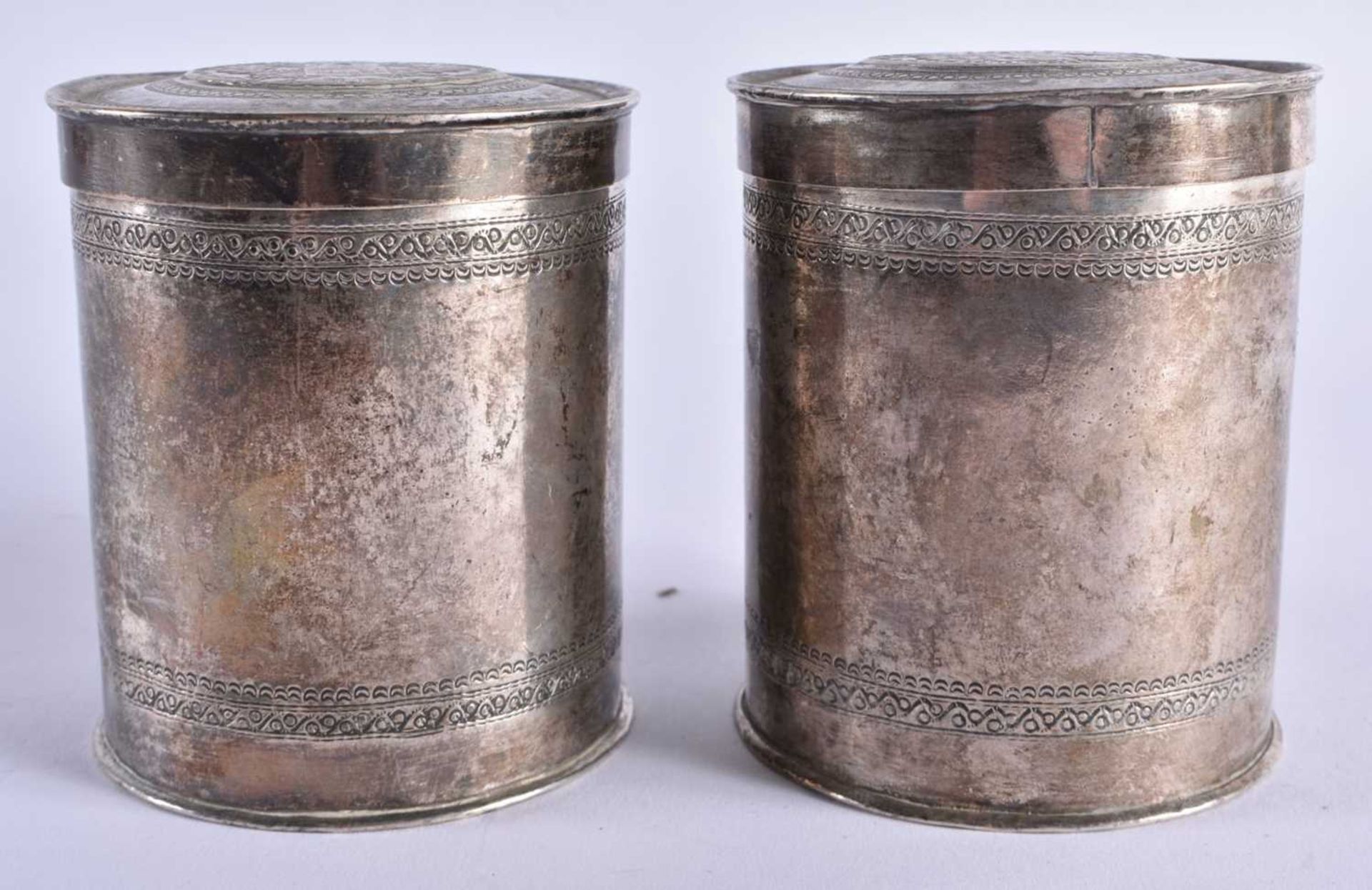 A PAIR OF ANTIQUE CONTINENTAL SILVER COIN INSET BOXES AND COVERS. 344 grams. 9 cm x 7.25 cm.