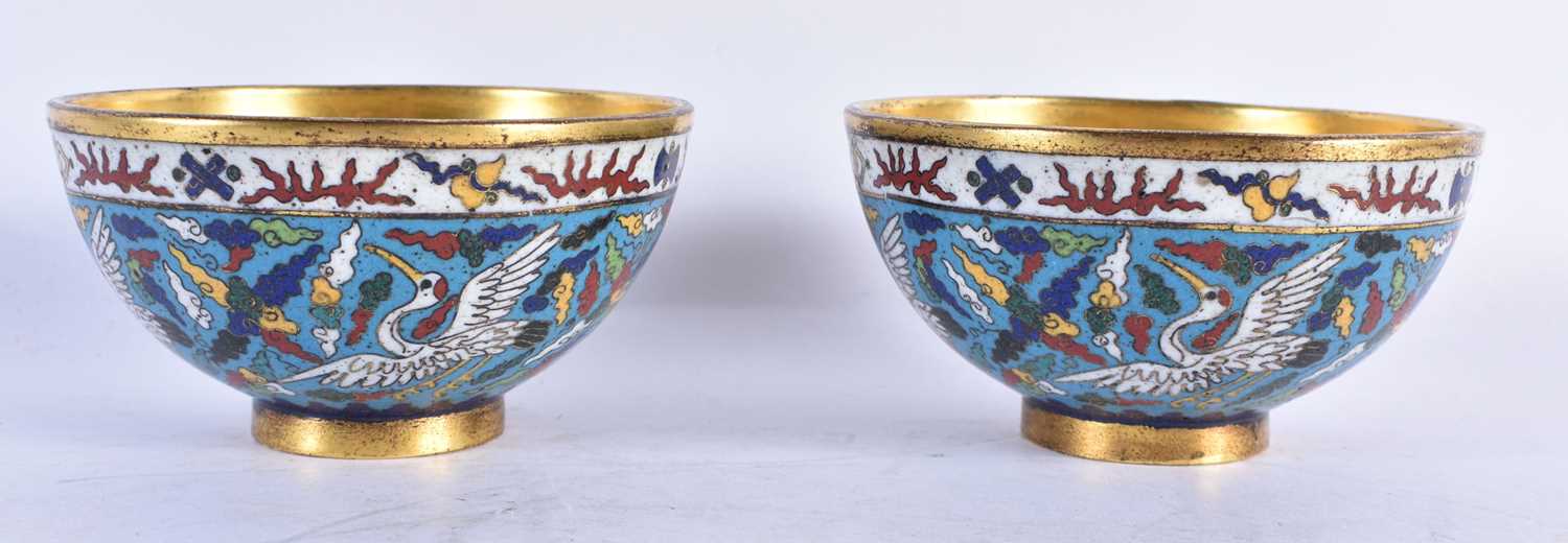 A FINE PAIR OF CLOISONNE ENAMEL BRONZE BOWLS Jiajing mark and probably of the period, decorated on a