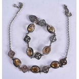 AN ARTS AND CRAFTS SILVER AND CITRINE NECKLACE with matching bracelet. 37 grams. Necklace 41 cm