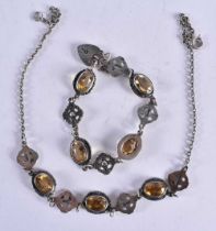 AN ARTS AND CRAFTS SILVER AND CITRINE NECKLACE with matching bracelet. 37 grams. Necklace 41 cm