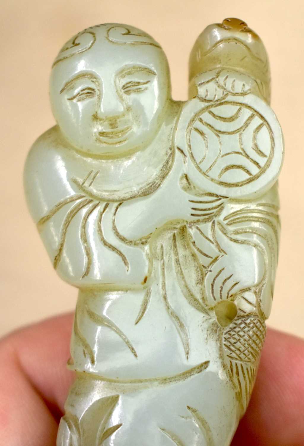 A LOVELY 19TH CENTURY CHINESE CARVED GREEN JADE FIGURE OF A STANDING MALE Qing, modelled holding a - Image 6 of 12