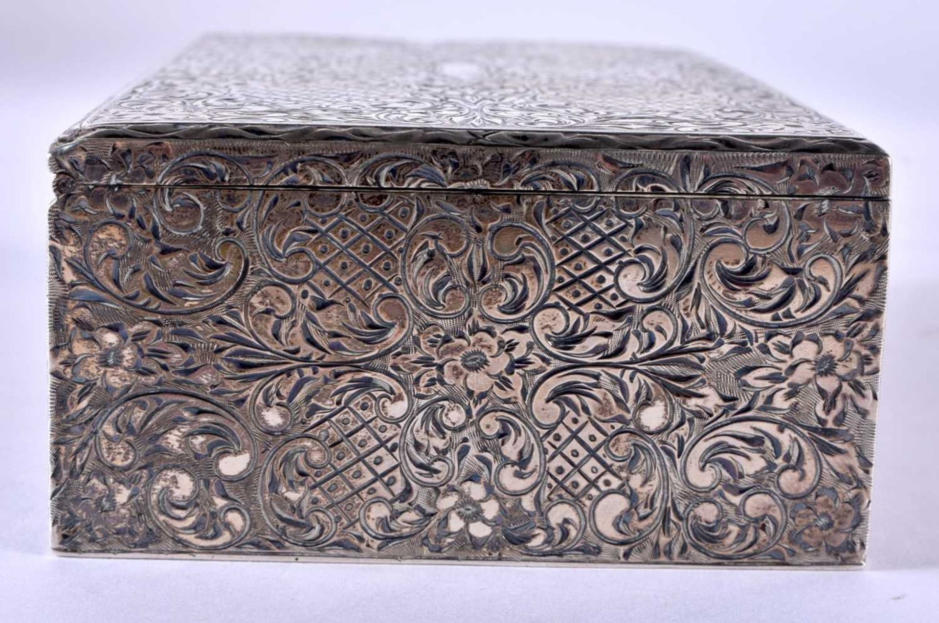 AN ANTIQUE CONTINENTAL ENGRAVED SILVER CASKET. 323 grams overall. 13 cm x 8.5 cm. - Image 3 of 6