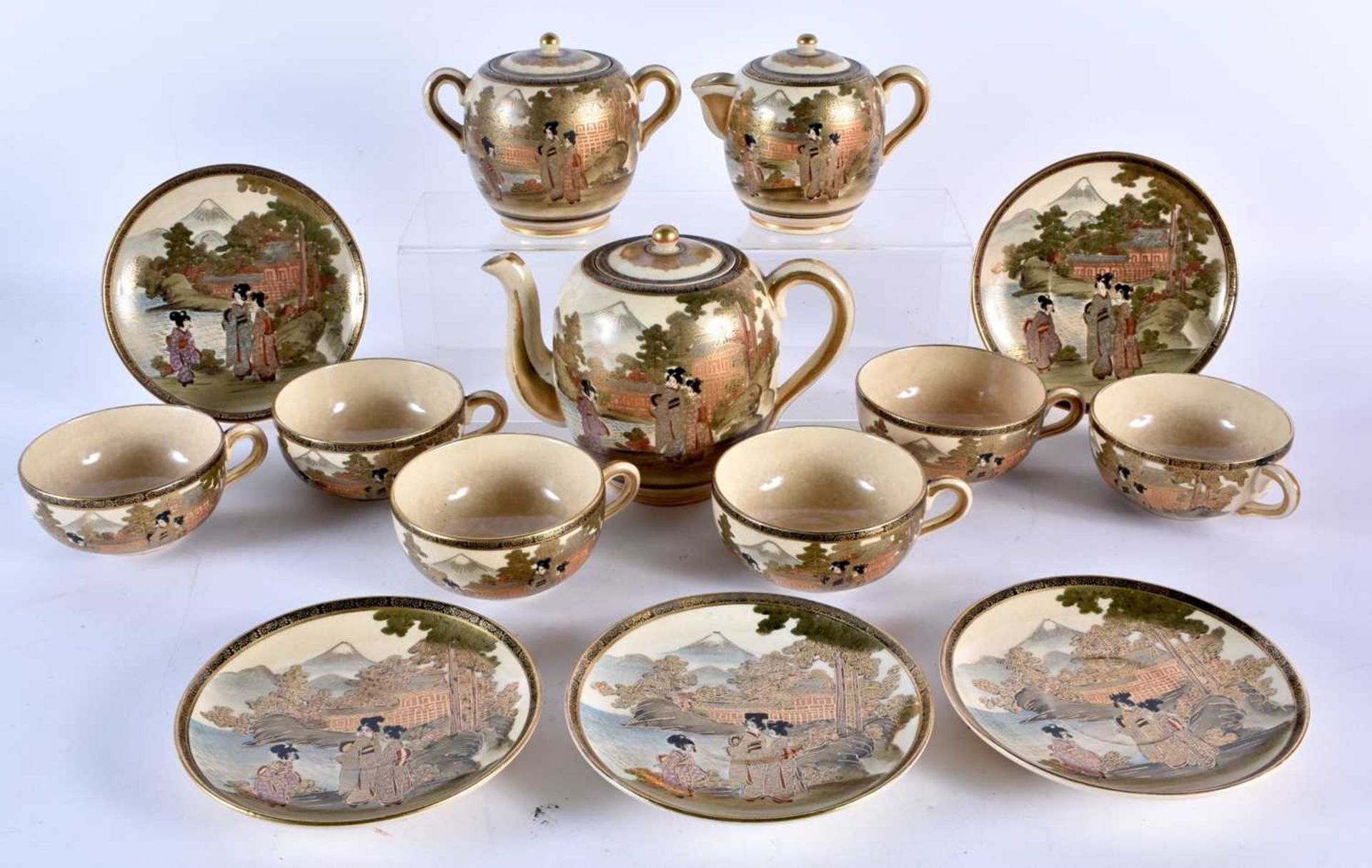 A LATE 19TH CENTURY JAPANESE MEIJI PERIOD SATSUMA TEASET painted with figures and landscapes.