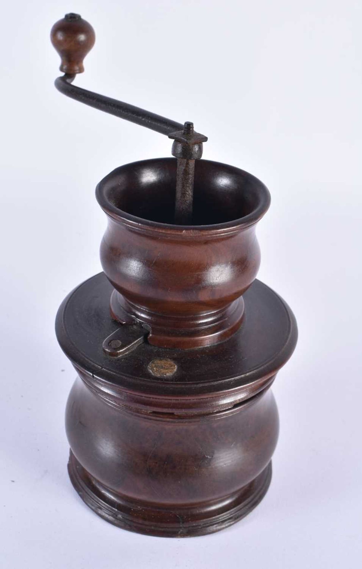 A GEORGE III CARVED TREEN COFFEE GRINDER with stylised iron handle. 19 cm x 14 cm. Note: The first - Image 2 of 4