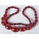 Cherry Bakelite graduated necklace. 66cm long, weight 66g, largest bead 19mm