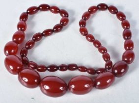 Cherry Bakelite graduated necklace. 66cm long, weight 66g, largest bead 19mm