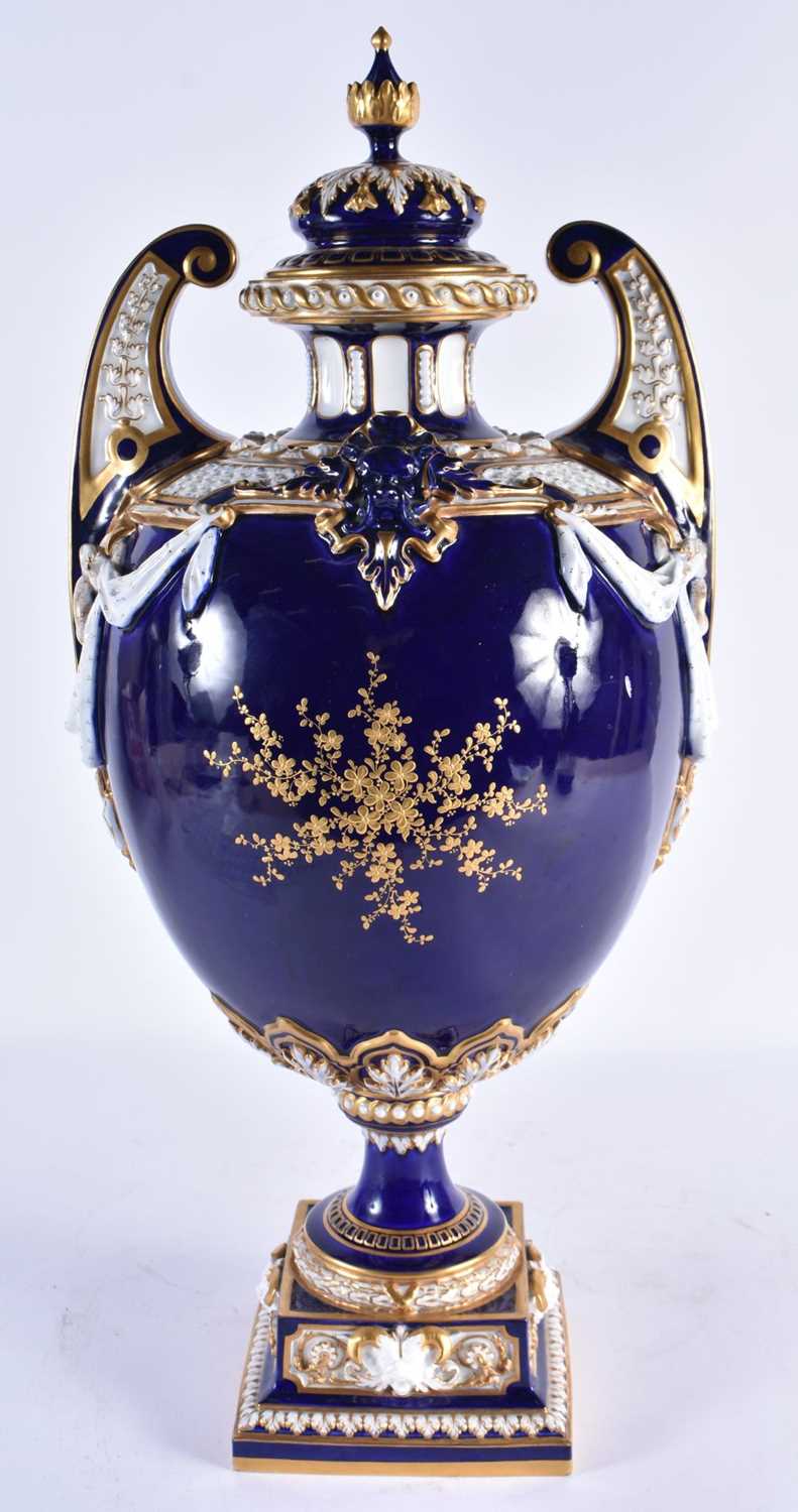 A FINE ROYAL WORCESTER TWIN HANDLED BLUE PORCELAIN VASE AND COVER painted with a landscape by - Image 4 of 9