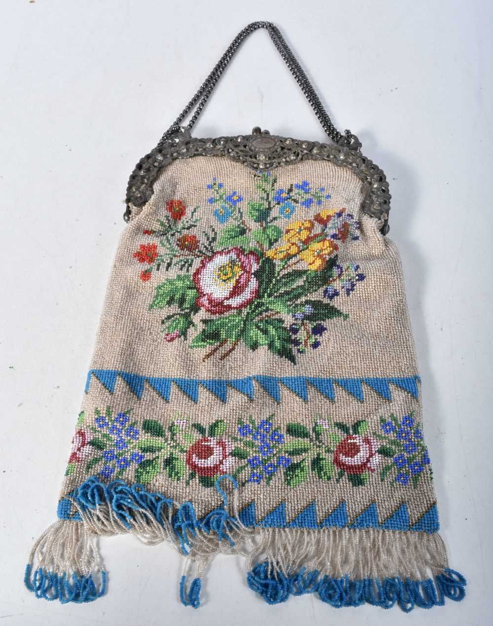 Antique Victorian micro beaded evening purse with glass seed beads and white metal mounts.  27cm x
