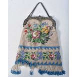 Antique Victorian micro beaded evening purse with glass seed beads and white metal mounts.  27cm x