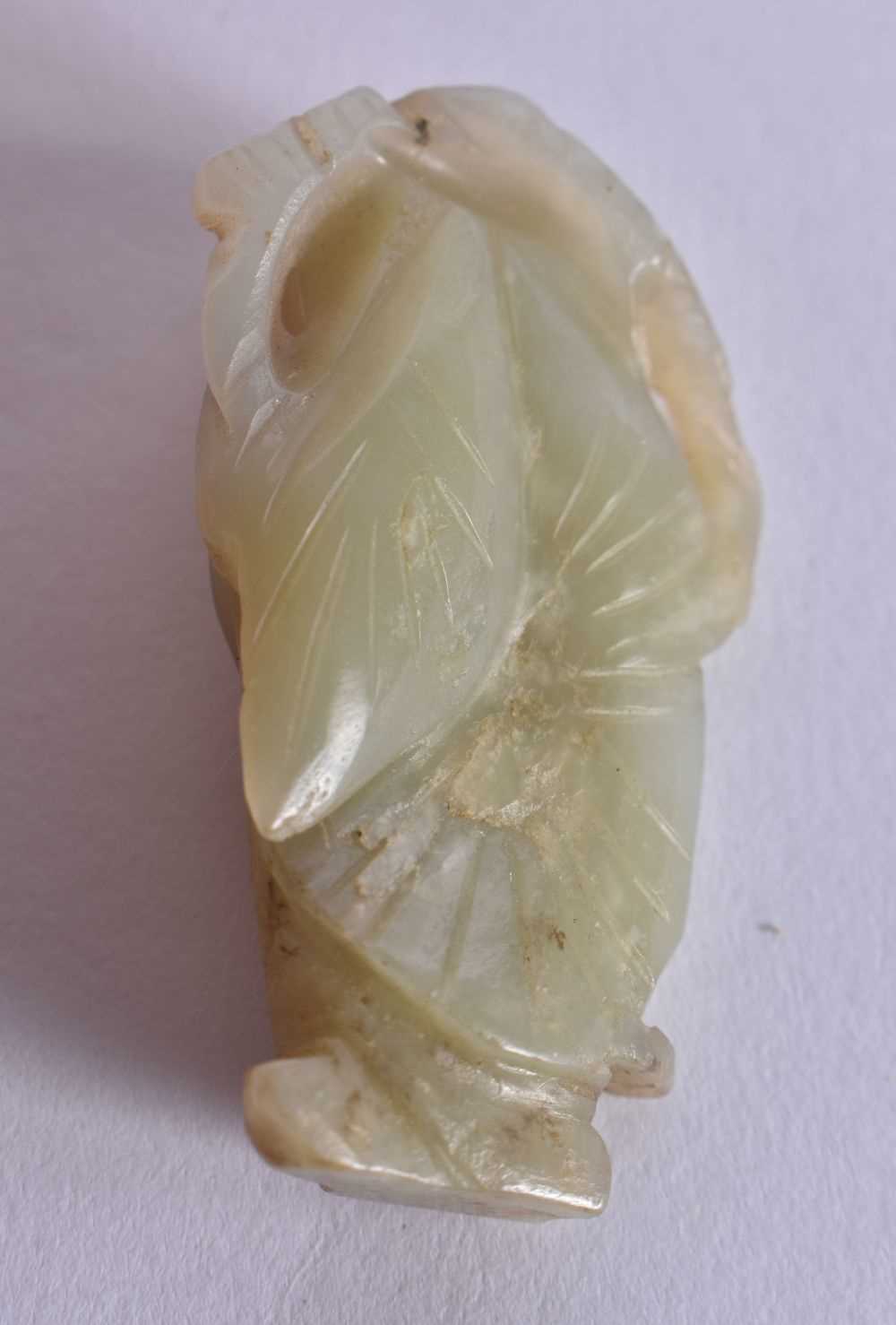 A SMALLER 19TH CENTURY CHINESE CARVED GREEN JADE FIGURE OF A BOY Qing. 4.5 cm x 2 cm. - Image 2 of 3