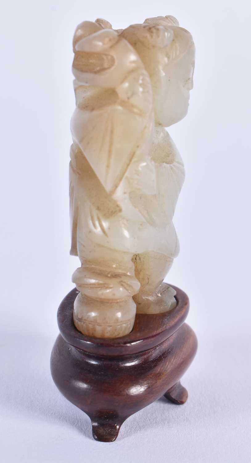 A 19TH CENTURY CHINESE CARVED JADE FIGURE OF A YOUNG CHILD Qing, modelled holding foliage. 7.5 cm - Image 6 of 7