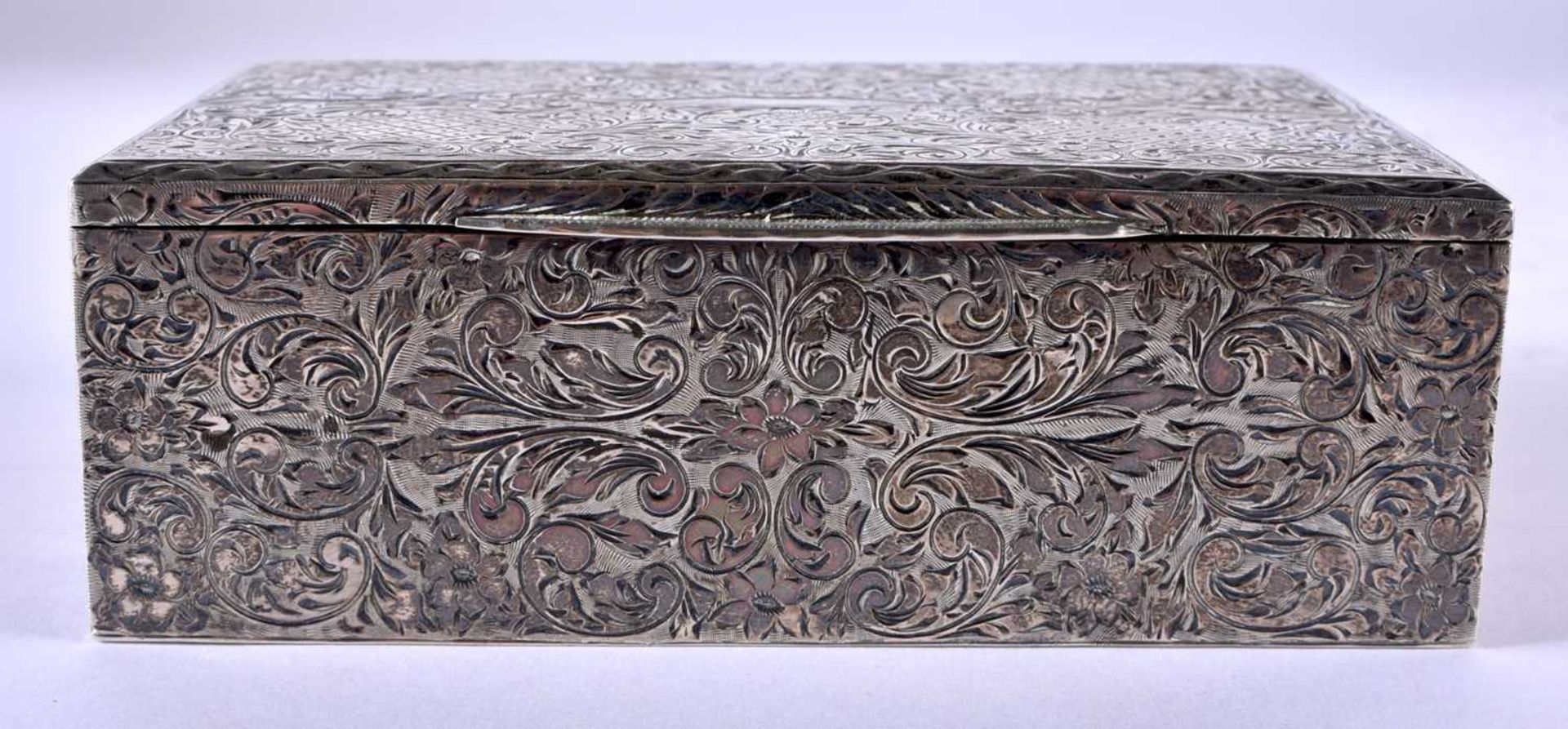 AN ANTIQUE CONTINENTAL ENGRAVED SILVER CASKET. 323 grams overall. 13 cm x 8.5 cm.