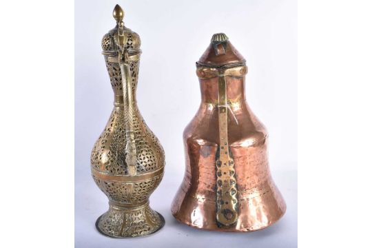 AN 18TH/19TH CENTURY ISLAMIC MIDDLE EASTERN RETICULATED BRASS EWER together with a copper jug. - Image 4 of 6