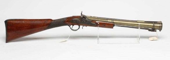 A PERCUSSION BLUNDERBUSS by Thomas, late 18th century, the 15 1/2" brass barrel octagonal at the