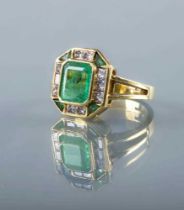 AN ART DECO STYLE EMERALD AND DIAMOND PLAQUE RING, the square cut emerald collet set to a border