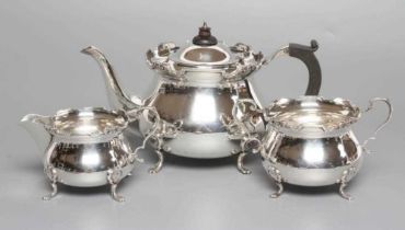 A SILVER THREE PIECE TEA SERVICE, maker's mark WA, Birmingham 1930 & 1931 (teapot), of baluster form