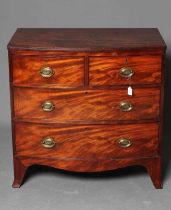 A REGENCY MAHOGANY BOWED CHEST, early 19th century, the reeded edged top over two short and two long
