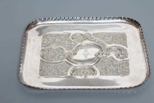 A LATE VICTORIAN SILVER DRESSING TABLE TRAY, maker Huttons, Birmingham 1900, of rounded oblong