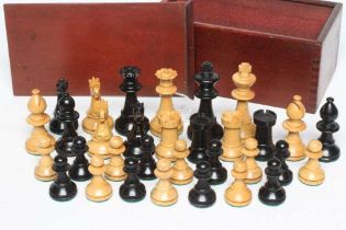 A BOX AND EBONY STAUNTON PATTERN CHESS SET, unmarked, king 2 3/4" high, in a stained box with