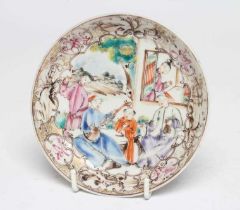 A CHINESE PORCELAIN SAUCER centrally painted in coloured enamels with a boy seated at a window