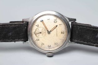 A GENTLEMAN'S LONGINES WRISTWATCH, the silvered dial with luminous Arabic numerals enclosing