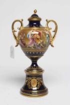 A VIENNA PORCELAIN TWO HANDLED VASE AND COVER, late 19th century, the rounded conical body with