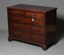 A GEORGIAN MAHOGANY CHEST, late 18th century, the moulded edged top over two short and three long