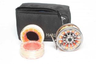 A HARDY DEMON 5000 FLY FISHING REEL with two spare spools and in a fitted case (Est. plus 24%