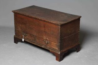 A GEORGIAN OAK BOARDED CHEST WITH TWO DRAWERS, mid-18th century(?), the cleated plank lid opening to
