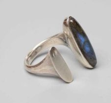 A GEORG JENSEN SILVER DRESS RING designed by Bent Gabrielsen with a polished Labradorite, stamped