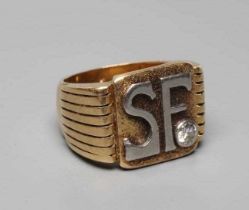 A GENTLEMAN'S DIAMOND SIGNET RING, the matt square panel applied with white metal intials SF with